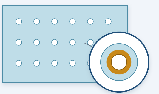A glass panel with through-glass vias and a magnified hole edge